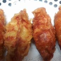 Spicy Pork Dumpling  · Deep fried pork dumplings
