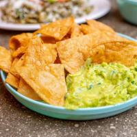 Guacamole And Freshly Fried Chips · 6 oz. Mexican avocados, onion, cilantro, lime, and jalapeno.