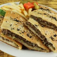Hawawshi Beef · Freshly baked bread made from our special dough stuffed with ground beef, onion, garlic, bel...