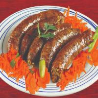 Mombar · Rice mixture stuffed sausage seasoned with our special spices.