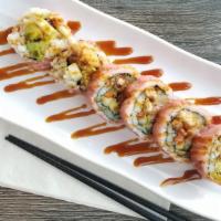 Spider Roll · Soft shell crab, cucumber, avocado, gobo, crab, wrapped w/ soy paper.