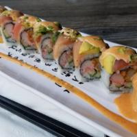 Bronco Roll · Tempura shrimp, cucumber, crab topped w/ fresh tuna and avocado.