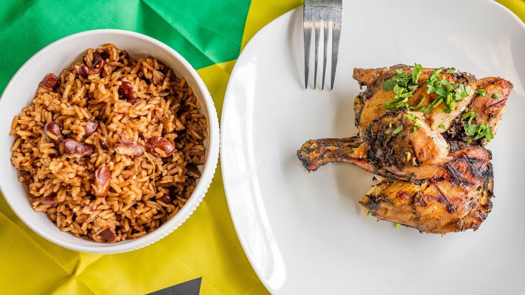 Jerk Chicken  · Comes with rice and peas, stem vegetables, and plantains.