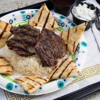 Steak Over Rice · Beef tenderloin.