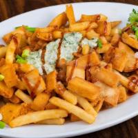 Chana Chaat · Vegetarian. Chickpeas Slow-Cooked In Mild Indian Spices, Topped With Crunchy Fries, Pita Chi...