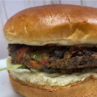 All Bean Vegan Burger · bean patty, vegan boon sauce, lettuce, onions, tomato, pickles, cucumber on a bun