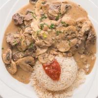 Beef Mushroom Sautee · Mushrooms · garlic and marsala sauce · served with rice
