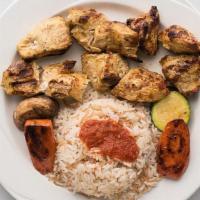 Chicken Kabob · 2 skewers, 5 pc per sk, marinated all white meat, served with rice & vegetables and choice o...
