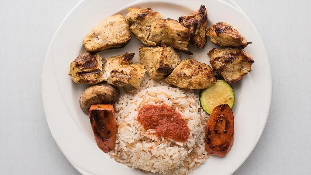Chicken Kabob · 2 skewers, 5 pc per sk, marinated all white meat, served with rice & vegetables and choice of soup or salad