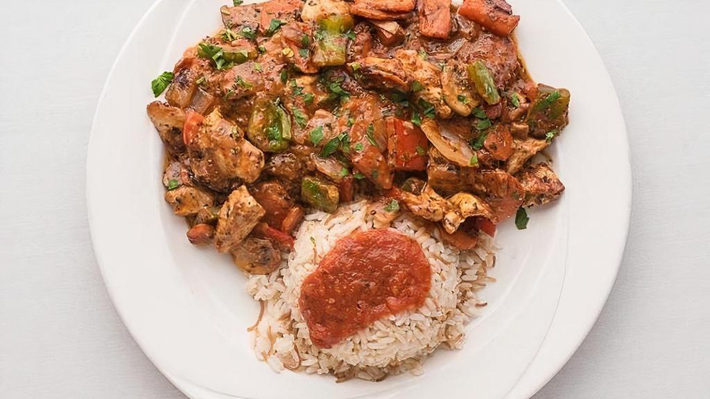 Chicken Ghallaba · Carrots · peppers · tomatoes · onions · mushrooms · special tomato sauce · served with rice