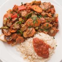 Veggie Ghallaba · Carrots · peppers · tomatoes · onions · mushrooms · special tomato sauce · served with rice