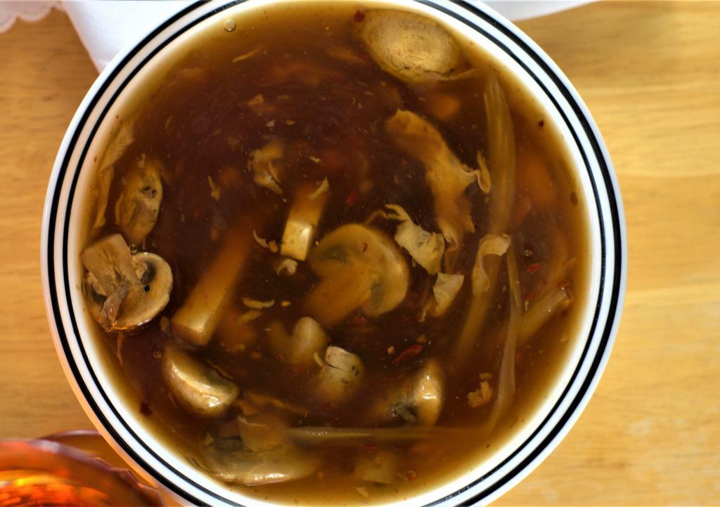 Hot And Sour Soup · *spicy* rich spicy chicken broth with pork, bean curd and bamboo shoots.