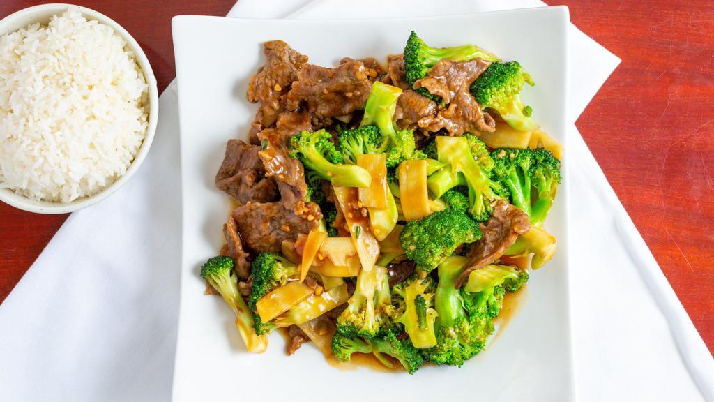 Beef With Broccoli · Sliced beef sauteed with broccoli and bamboo shoots in tasty brown sauce. served with steamed rice.