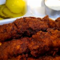 Nashville Hot Chicken Strips · Amazing, tasty, and spicy Nashville Hot Chicken Strips!  Get 4 strips on top of white bread,...