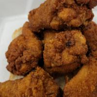 Classic Chicken · 7 amazingly seasoned chicken wings (wingettes), breaded and fried atop of white bread.