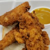 Chicken Strips · Same amazing seasoning.  4 chicken strips atop of white bread and a side of sauce (choice of...