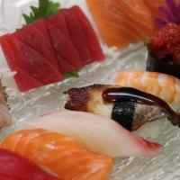 Sushi & Sashimi Combo · 6 pcs sushi, nine pcs sashimi, and one tuna roll, chef's choice.