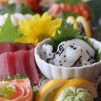 Sashimi Deluxe · 12 pieces of raw fish, chef's choice.