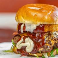 Texas Burger · Turkey Bacon, Onion Ring, Lettuce, Tomatoes, Onions, Pickles, Mayo, Sweet BBQ, Yellow Americ...