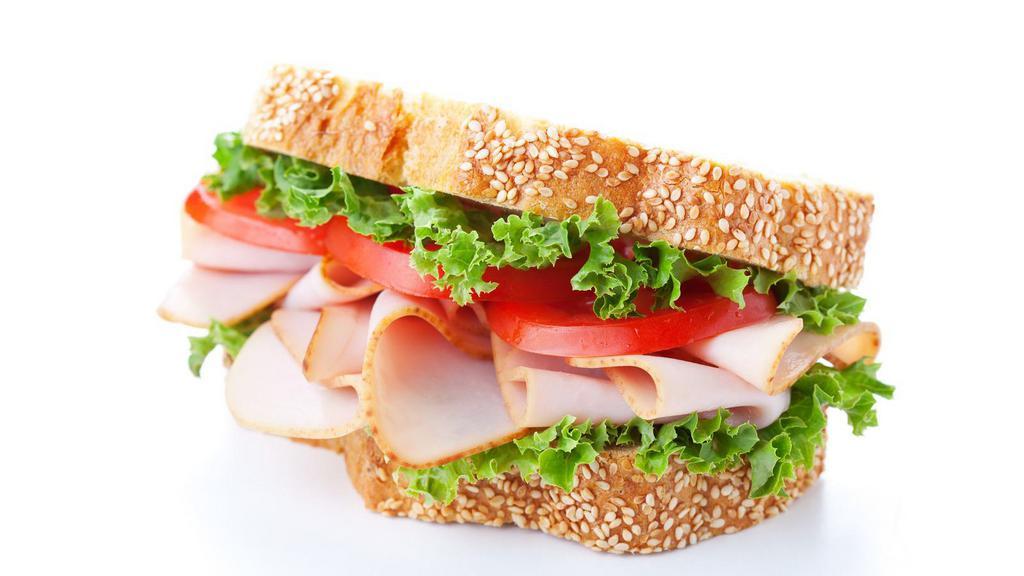 Turkey Sandwich · Delicious sandwich prepared with White turkey with lettuce, tomato and mayo.