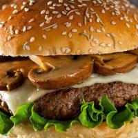 Mushroom Swiss · Single burger with sautéed onions and garlic, portobello mushrooms, lettuce, tomato, Swiss c...
