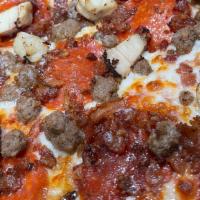 The Meats Pizza · Our meats pizza with sausage, pepperoni, bacon, sliced chicken served on hand-tossed dough w...