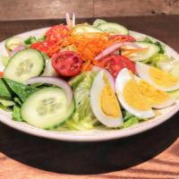 Angelo'S Salad · romaine, iceberg, tomato, red onion, carrot, cucumber, croutons, hardboiled egg, choice of d...