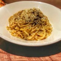 Cacio E Pepe · Pecorino Romano, Parmigiano-Reggiano, spaghetti, and olive oil.