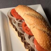 Gyro Sub · Fresh and toasted Turano sub bread stuffed with gyro meat along side lettuce, tomato, onion ...