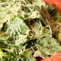 Caesar Salad · Iceberg/Romaine Mix, Shredded Parmesan, Croutons and Caesar Dressing.