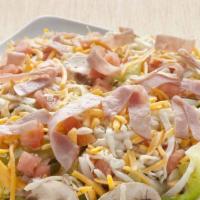 Italian Salad · Iceberg/Romaine Lettuce Mix, Mushrooms, Onions, Green Peppers, Tomatoes, Black Olives, Peppe...
