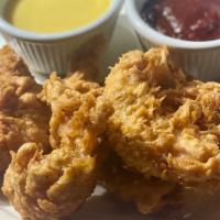 Chicken Tender Appetizer · Lightly fried chicken, served with our in house honey mustard and hickory sauce
