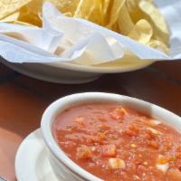 Chips And Salsa · Our fresh, in house made salsa served with our tortilla chips.