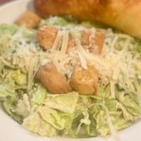 Caesar Salad · Romaine, parmesan, fresh baked croutons and dressing on the side.