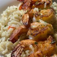 Seasoned Shrimp · A Skewer of shrimp, seasoned and grilled.  Served over rice.