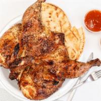 Whole Chicken · Served with pita bread and homemade salsa and BBQ sauce.