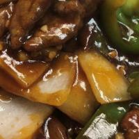 Pepper Steak · Beef stir fry with green pepper, white onion, and bamboo shoot in a house brown sauce.
