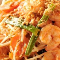 Shrimp Pad Thai · Hot & spicy. Shrimp stir fry with rice noodle, carrot and onion in a sweet and spicy red sau...