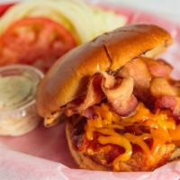 Western Chicken · 8 oz. Chicken Breast smothered in BBQ Sauce and topped with Cheddar Cheese and Bacon, served...