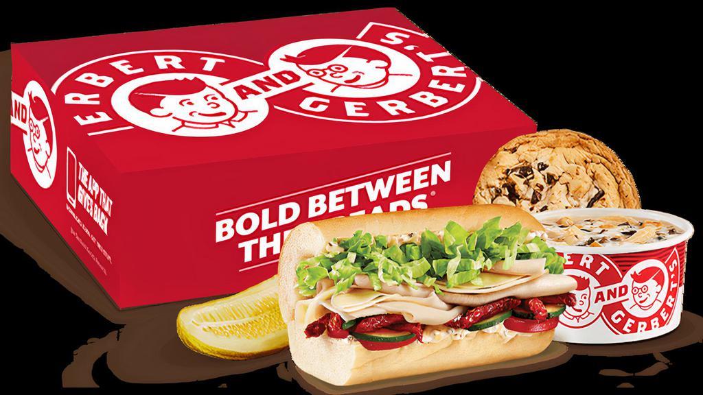 Pick Two Box Lunch Titan · A half sandwich with Sliced Turkey Breast topped with Pesto Mayo, Provolone Cheese, Sun-Dried Tomatoes, Cucumber, Tomatoes and Lettuce that comes with a choice of soup, pickle & a cookie.<br>(570 - 1,540 Cal)