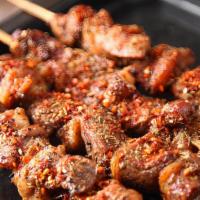 Lamb Skewers (4 Pc) · Lamb on a stick in spicy cumin sauce.