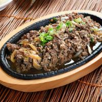 Beef Bulgogi · (Korean style thin sliced tender beef marinated with white and green onion in house sauce)