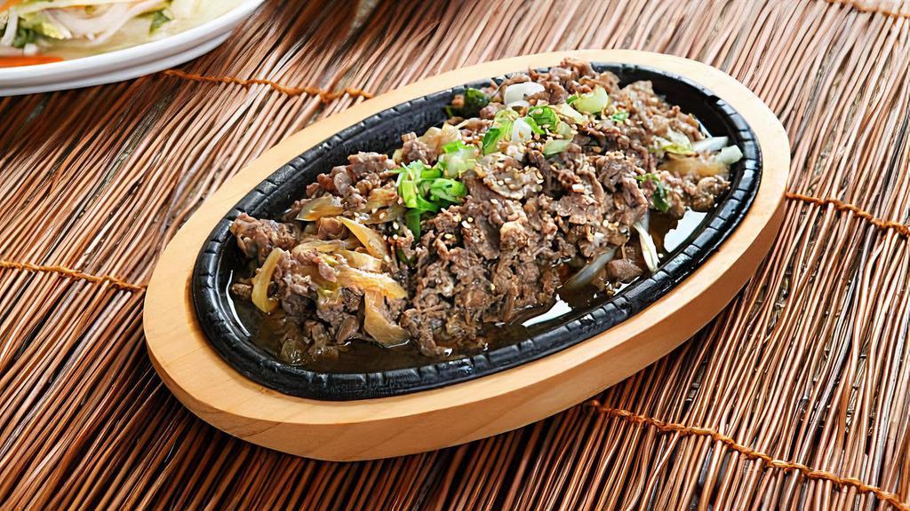 Beef Bulgogi · (Korean style thin sliced tender beef marinated with white and green onion in house sauce)