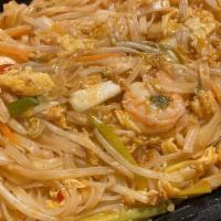 Pad Thai · Spicy. Rice noodles tossed with sauteed shrimp, chicken and fresh vegetables.
