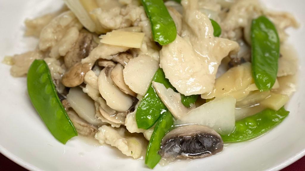 Moo Goo Gai Pan · White meat chicken, mushrooms, snow peas, water chestnuts and bamboo shoots in a white wine sauce.