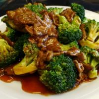 Beef Broccoli · Slices of beef with fresh broccoli in brown sauce.