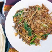 Moo Shu Pork · A saute of shredded pork and Chinese cabbage with scrambled egg stirred into the mix. Served...