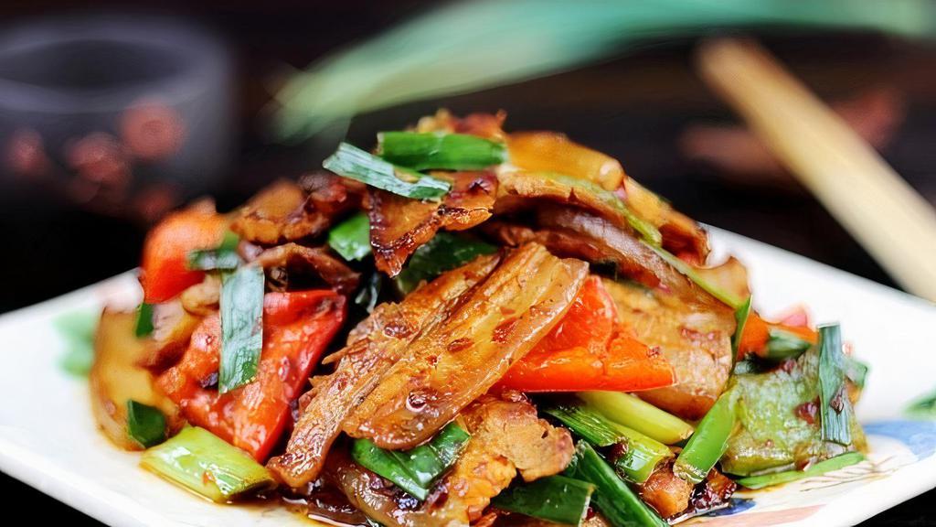 Double Cooked Pork · Spicy. (Sliced pork belly stir-fried with leeks, red pepper, white onion in chef special brown sauce)