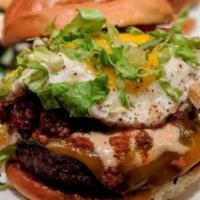 Stockyard Burger · Tomato, onion, grilled jalapeños, pepperjack, bacon, chipotle ranch.