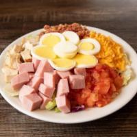 Individual Cobb Salad · A side portion of fresh and crisp iceberg and romaine lettuce topped with Chicken, Bacon, Ha...